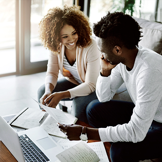 people looking at some papers