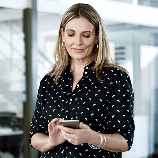 woman texting in her phone
